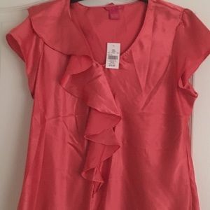 Coral colored women’s dressy blouse